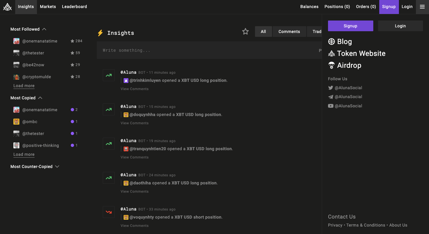 Screenshot of the Aluna.Social homepage with trader leaderboard